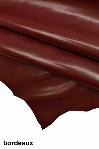 Premium Photo  Red leather texture that is very bright and has a red  background.