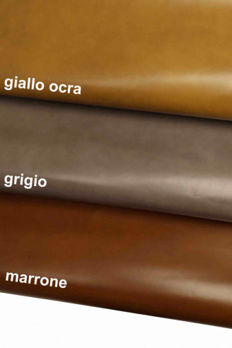 Pelle italiana, mezzo vitello abrasivato con nuvolature di colore, abbastanza lucido, rigido, 3 colori disponibili