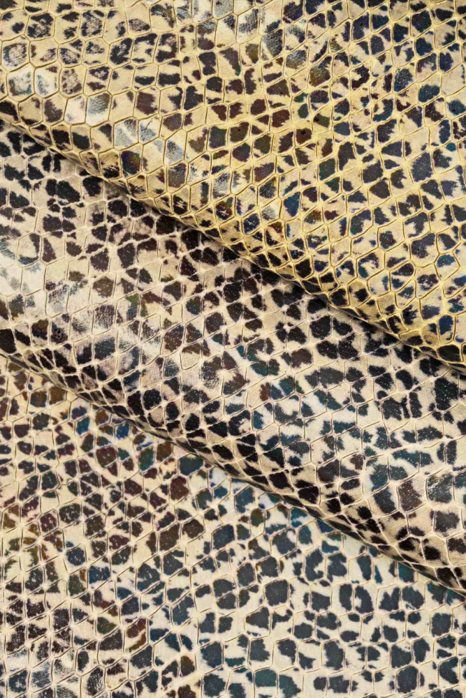 https://www.lagarzarara.com/47937-large_default/leopard-printed-leather-hide-iridescent-metallic-goatskin-platinum-black-scales-textured-engraved.jpg