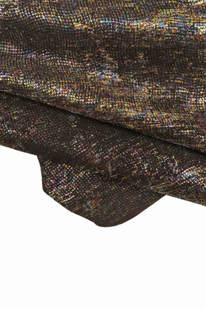 Pelle OLEOGRAFICA luminosa, capra laminata multicolor, pellame base nero con stampa astratta metallizzata, morbida