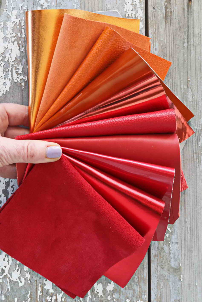 10 RED ORANGE leather scraps, metallic and not, smooth, SOLID tones, grains and softness various, random assortment