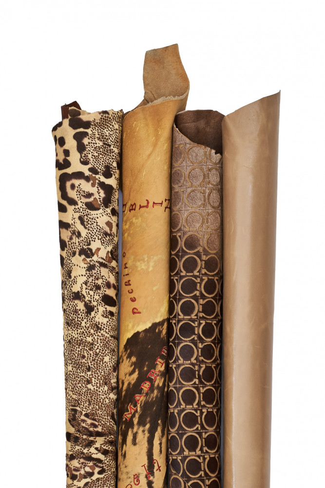 Assortment of 4 BEIGE brown leather hides, 3 printed hair on leather hides, 1 glossy smooth goatskin as per picture