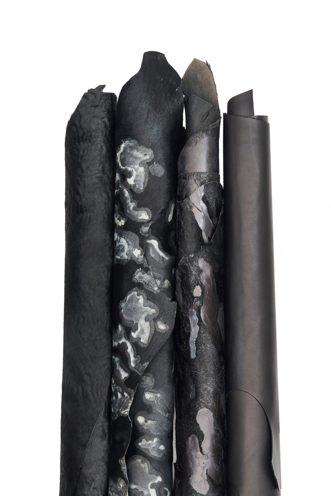 4 BLACK assorted leather hides, boundle of matching cowhides 3 printed hair on leather skins and 1 black smooth calfskin