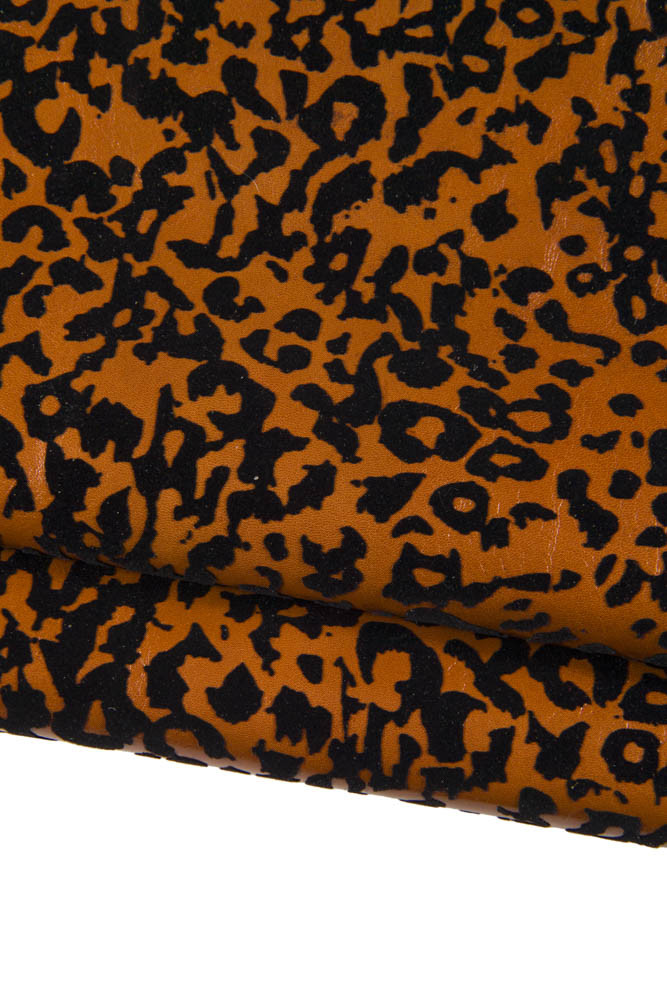 FLOCK leopard textured leather skin, brown glossy goatskin with black animal print, soft cheetah hide