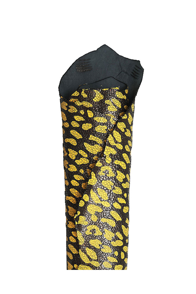 Yellow LEOPARD print on brown leather skin, metallic ray embossed goatskin with animal cheetah texture, soft hide