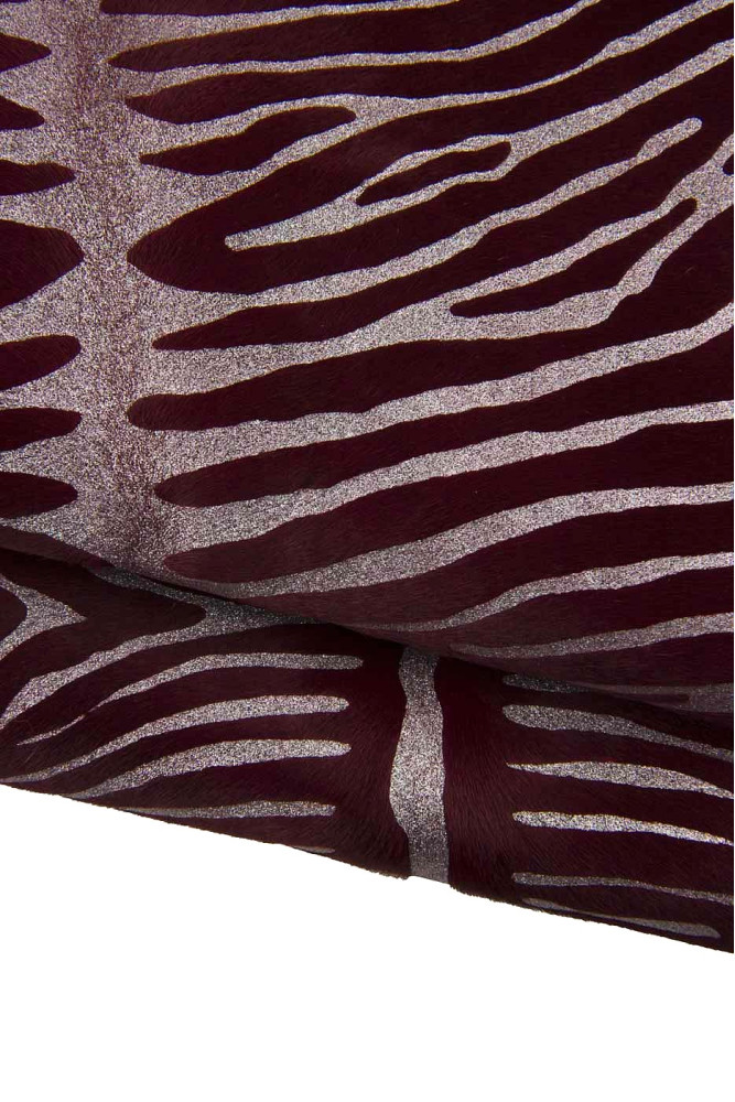 Pelle cavallino stampa ZEBRA bordeaux, vitello pony motivo animalier laminato argento, pellame di lusso